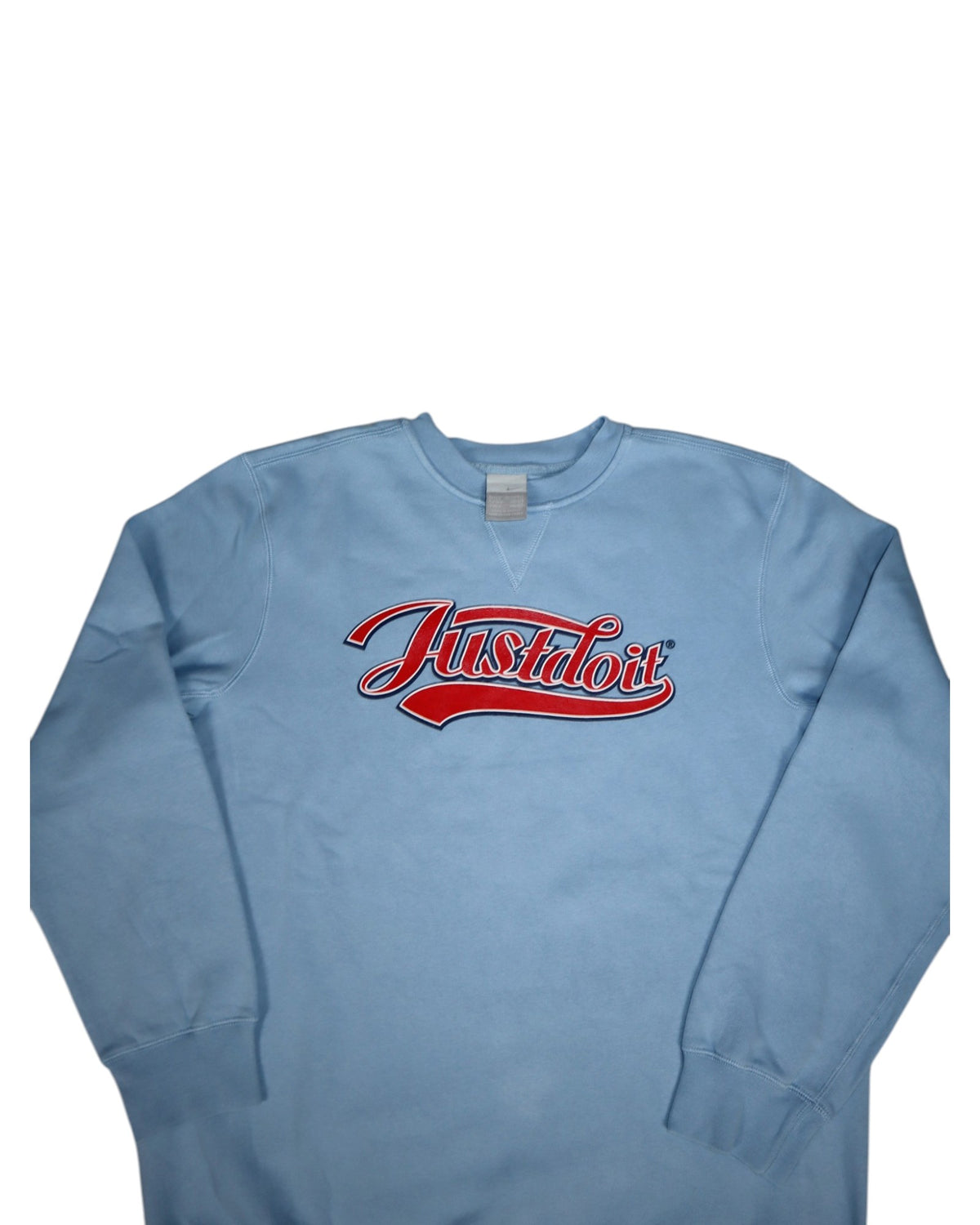 Vintage 2000s Nike Just Do It crewneck, baby blue, flat lay detail