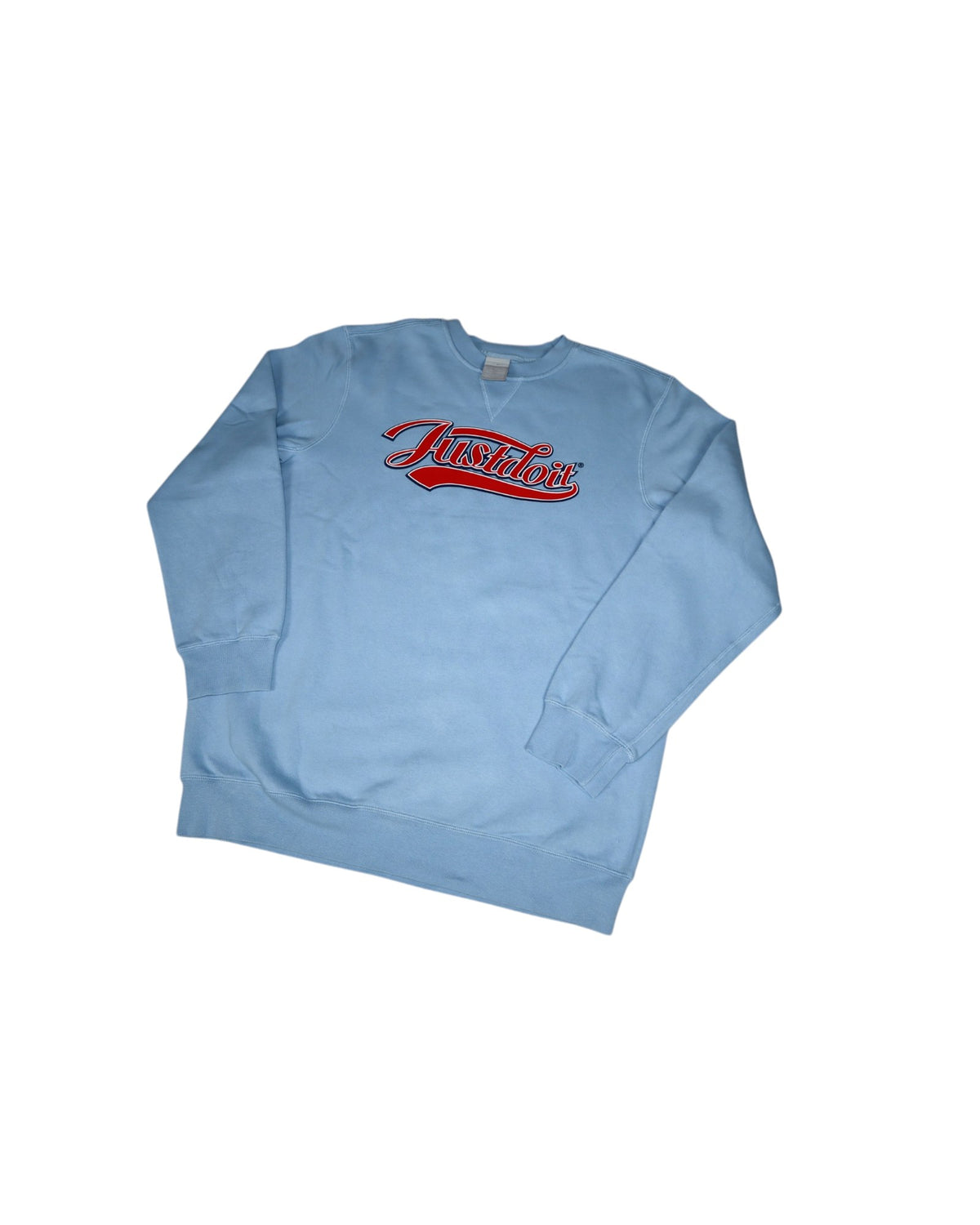 Vintage 2000s Nike Just Do It crewneck, baby blue, flat lay detail