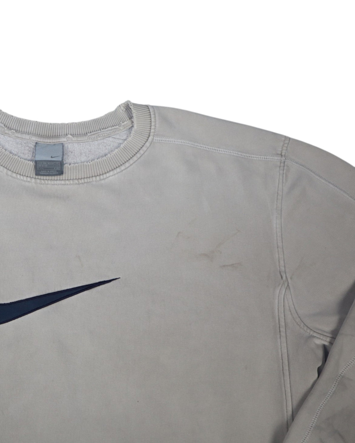 Vintage Nike distressed center swoosh crewneck, cream, flat lay detail