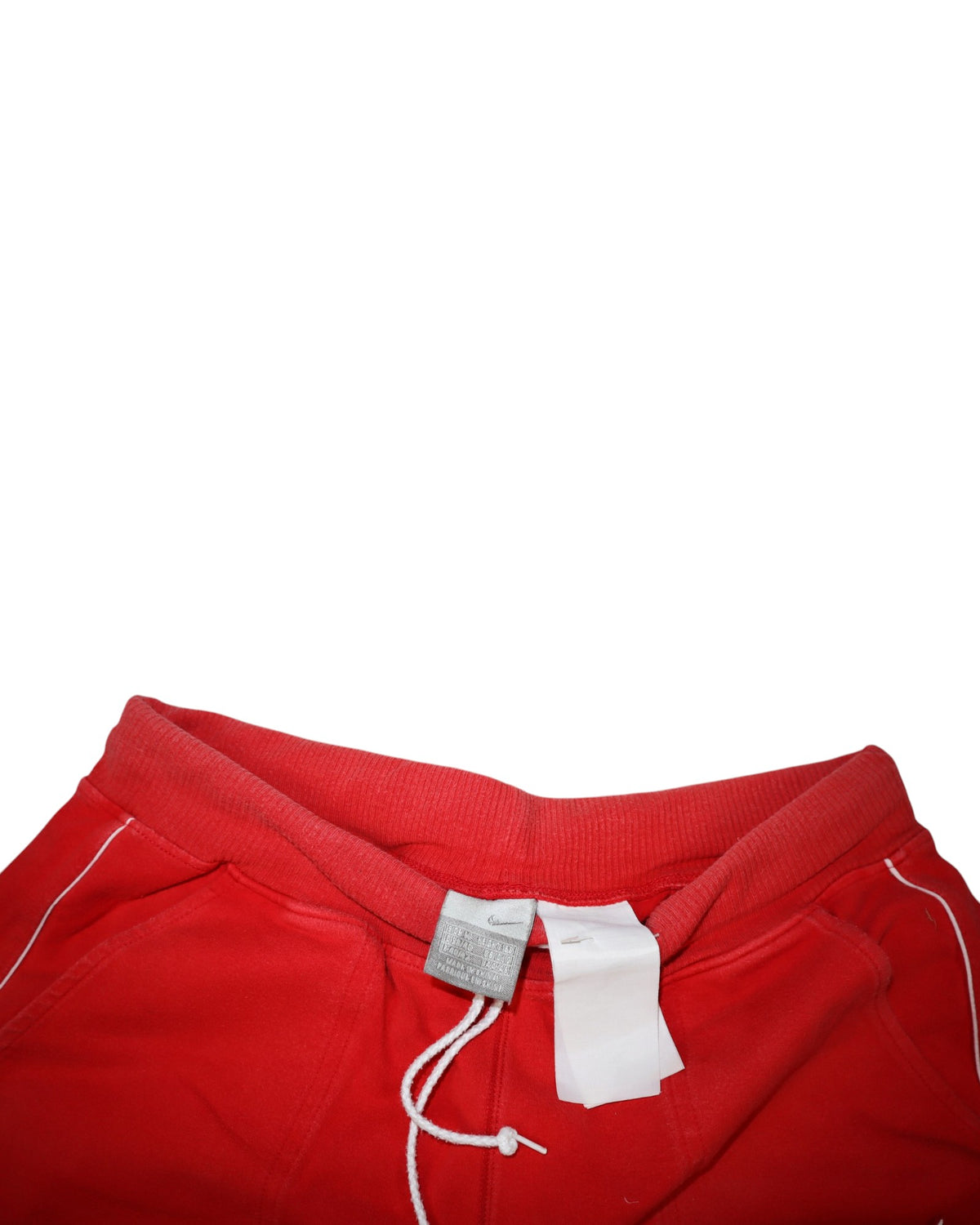 Vintage 2000s Nike capri trackpants, red, flat lay detail
