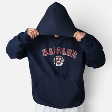 Vintage Champion Harvard University hoodie, navy, worn with hood up