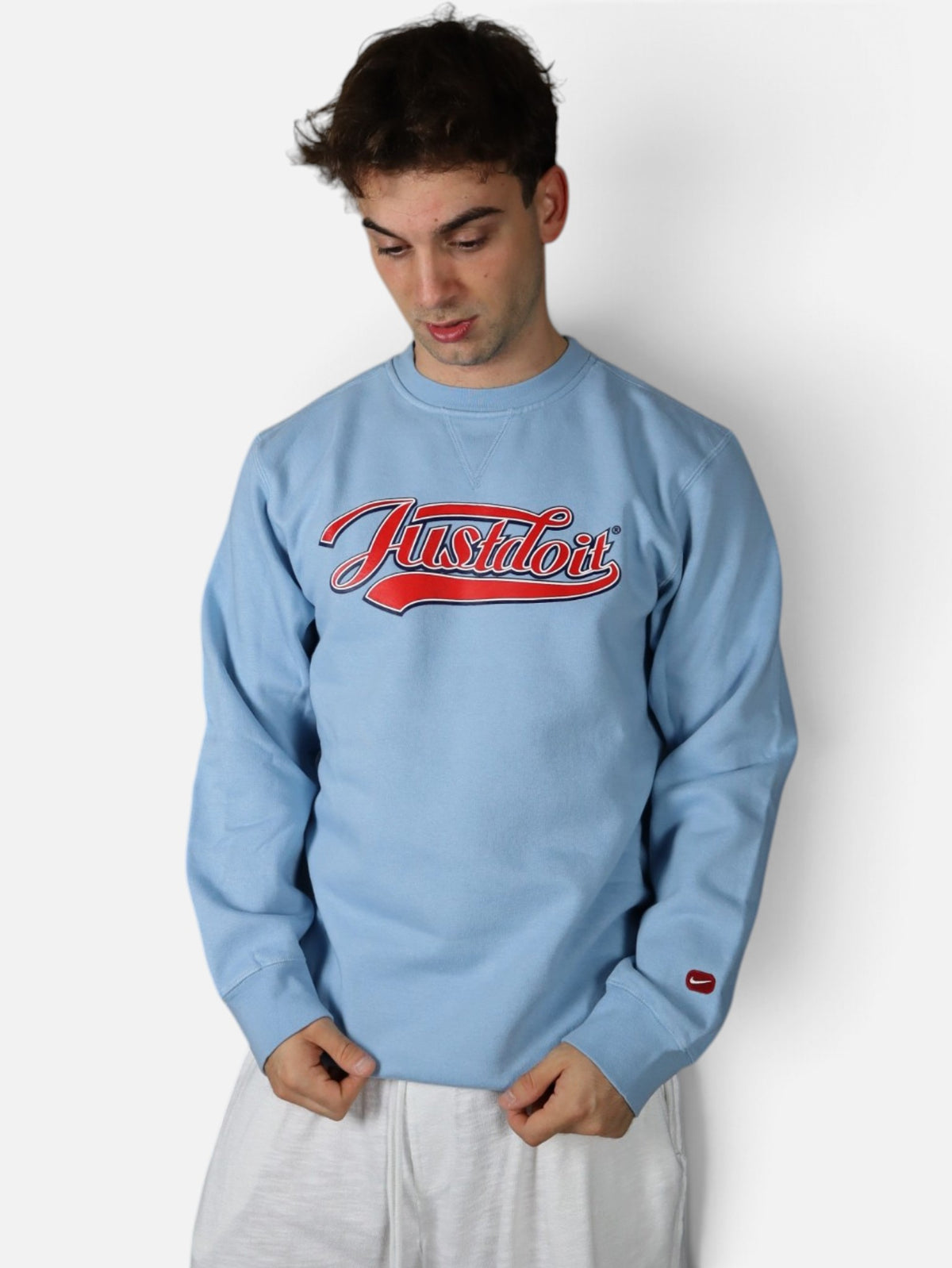 Vintage 2000s Nike Just Do It crewneck, baby blue, worn front