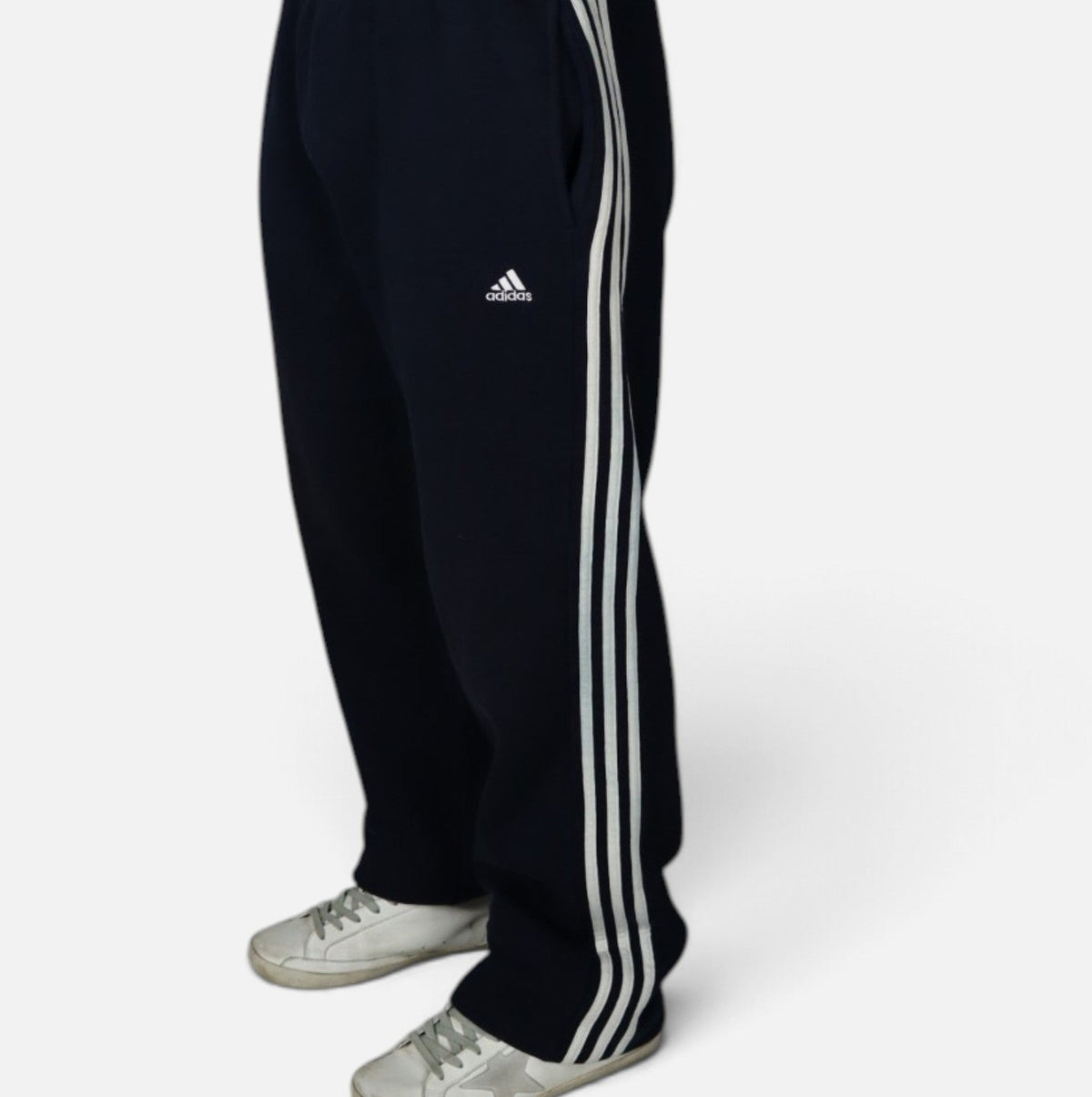 Vintage 2000s Adidas three stripe sweatpants, navy, worn side