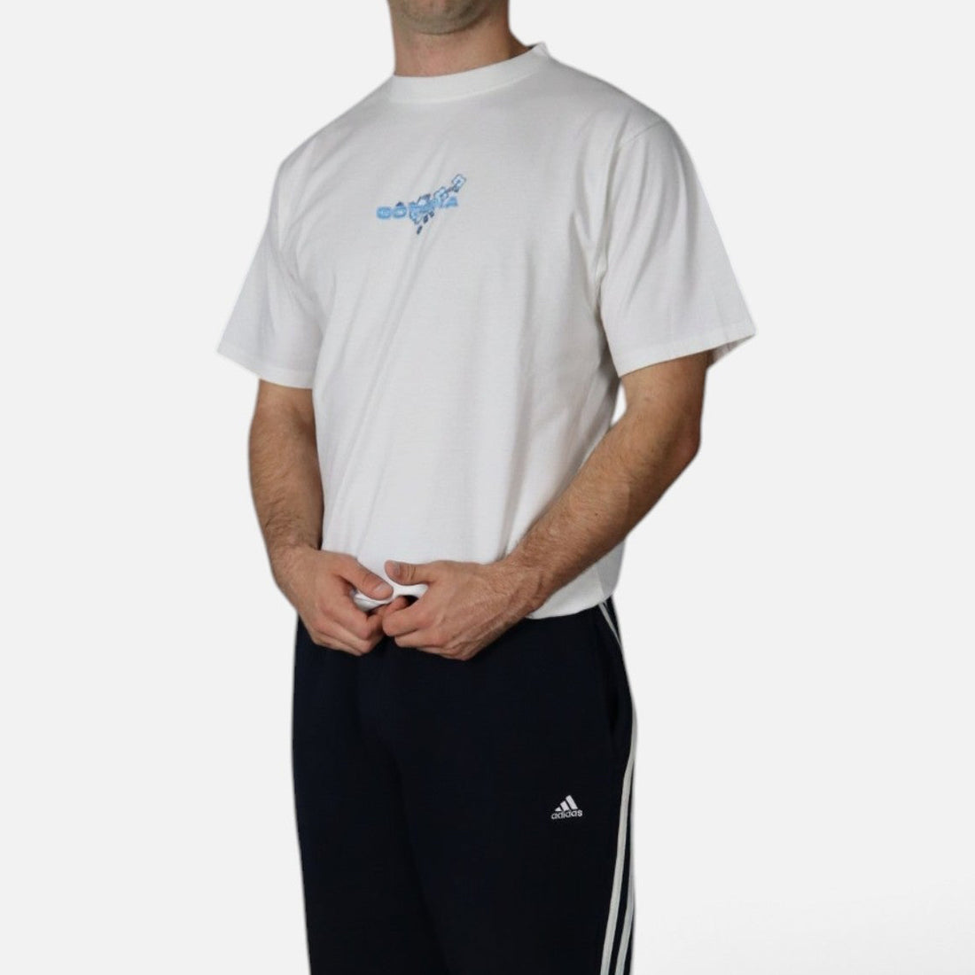 Vintage Gotcha surf tee and Adidas three stripe sweatpants, worn full fit