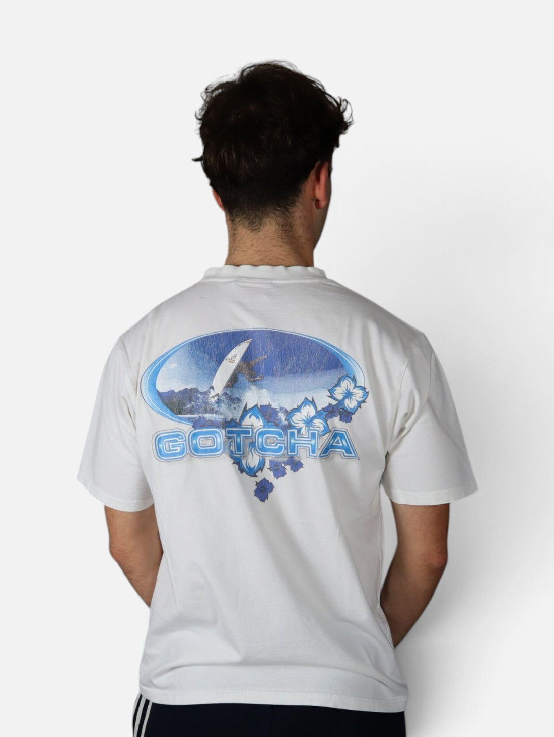 Vintage Gotcha surf tee and Adidas three stripe sweatpants, worn full fit