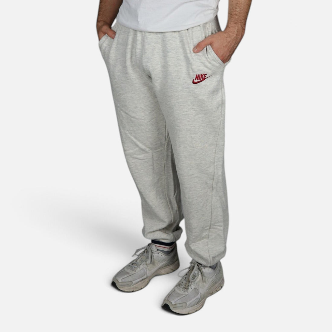 Early 90s Nike sweatpants in grey marl with red logo, made in Greece — worn
