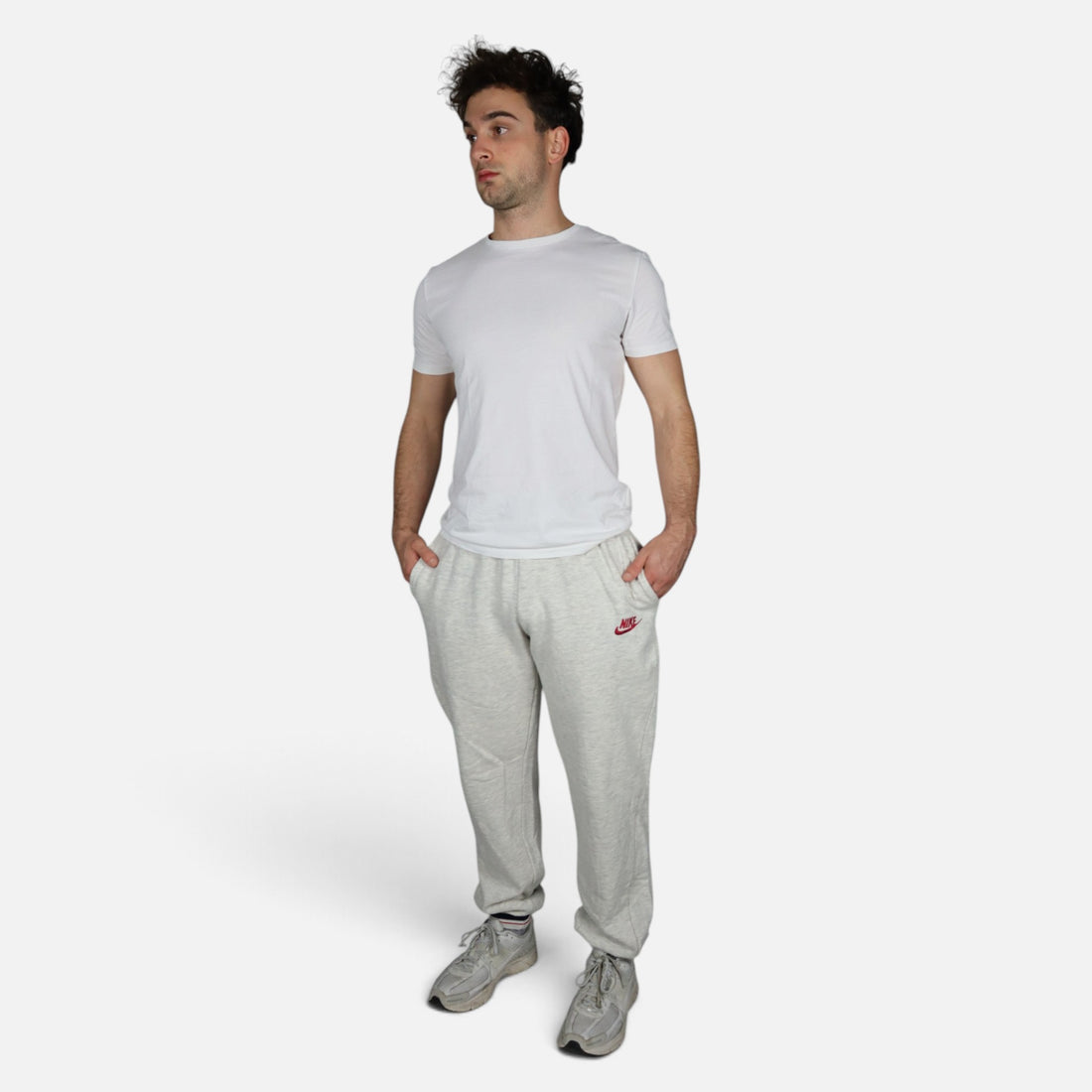 Early 90s Nike sweatpants in grey marl with red logo, made in Greece — worn