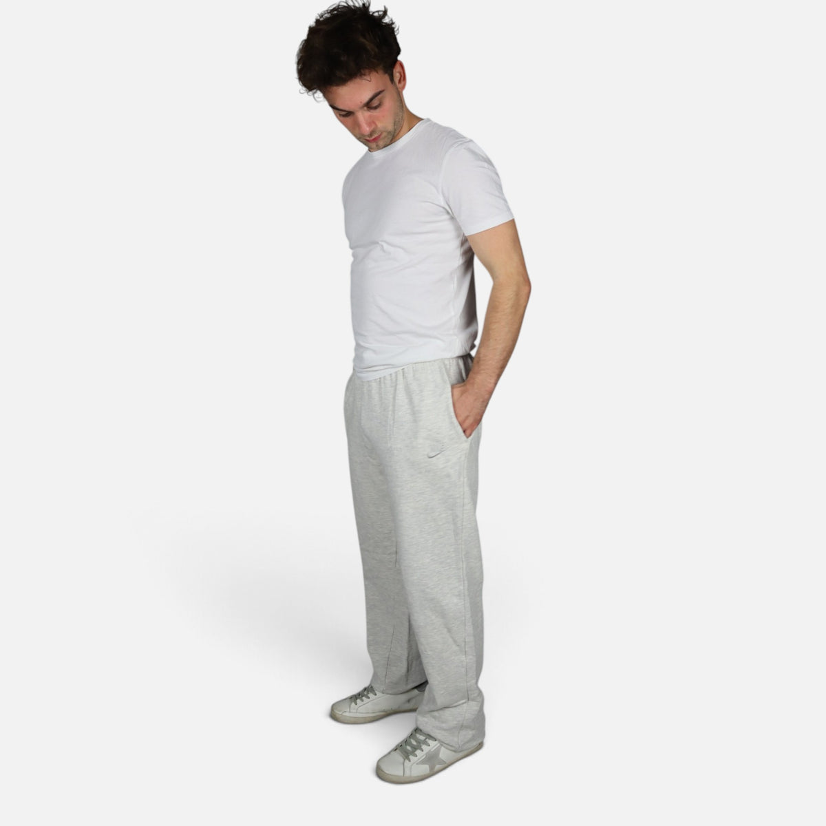 Early 90s Nike baggy sweatpants in grey marl, made in Greece — worn