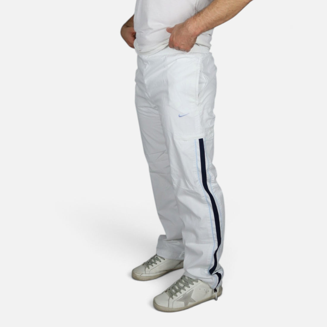 Y2K Nike trackpants in white with navy stripes — worn