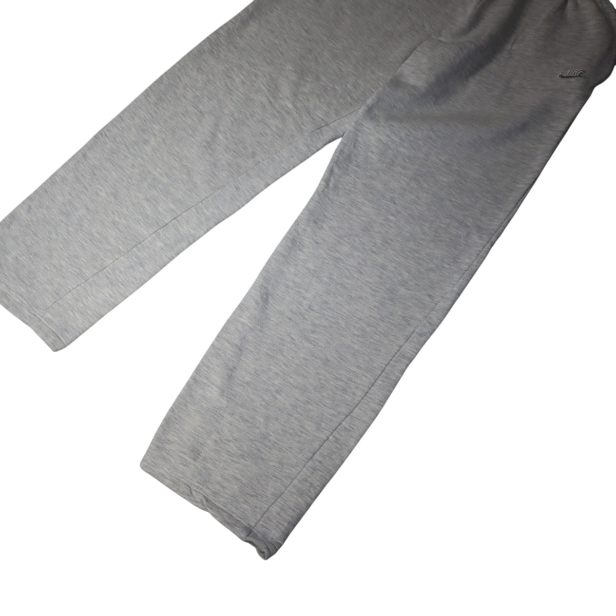 Early 90s Nike baggy sweatpants in grey marl, made in Greece — flat lay