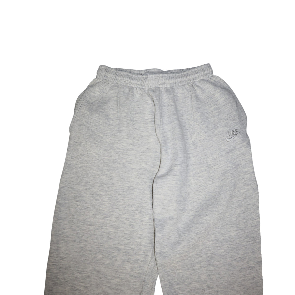 Early 90s Nike baggy sweatpants in grey marl, made in Greece — flat lay