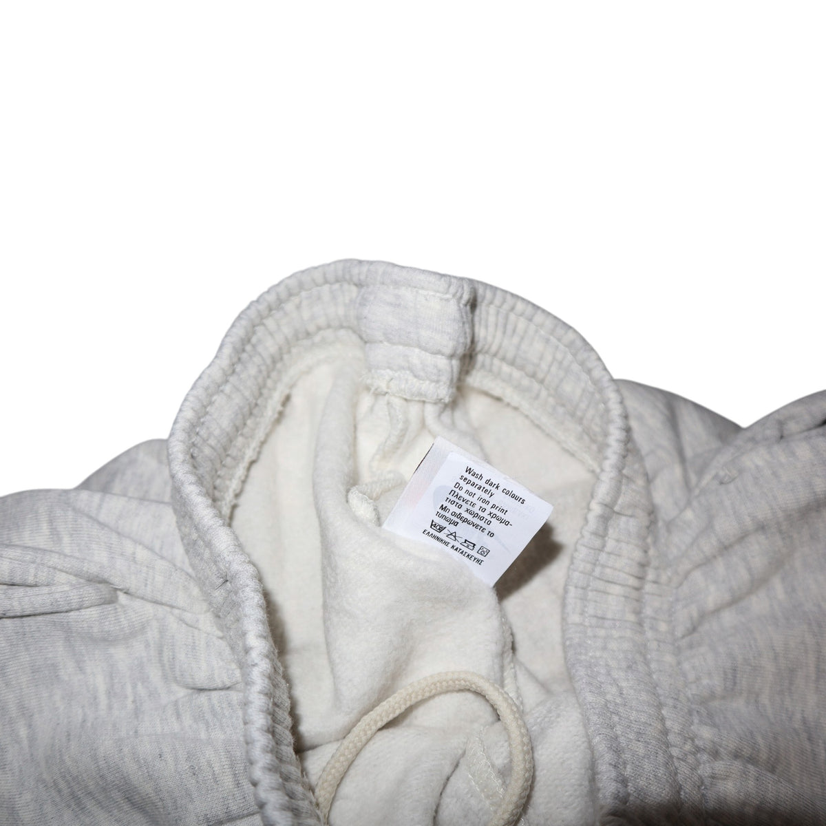 Early 90s Nike baggy sweatpants in grey marl, made in Greece — flat lay