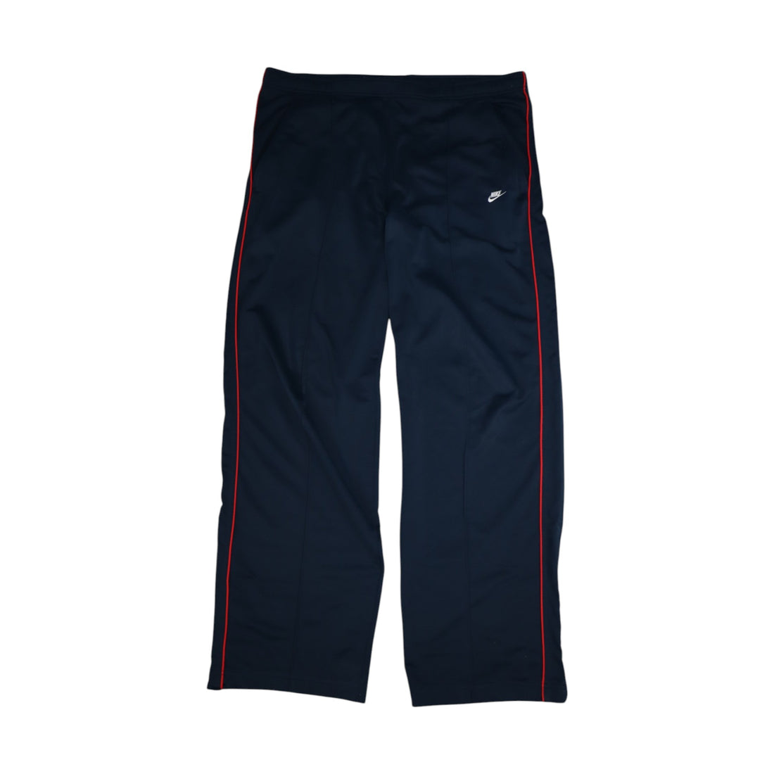2000s Nike trackpants in navy with red stripes — flat lay