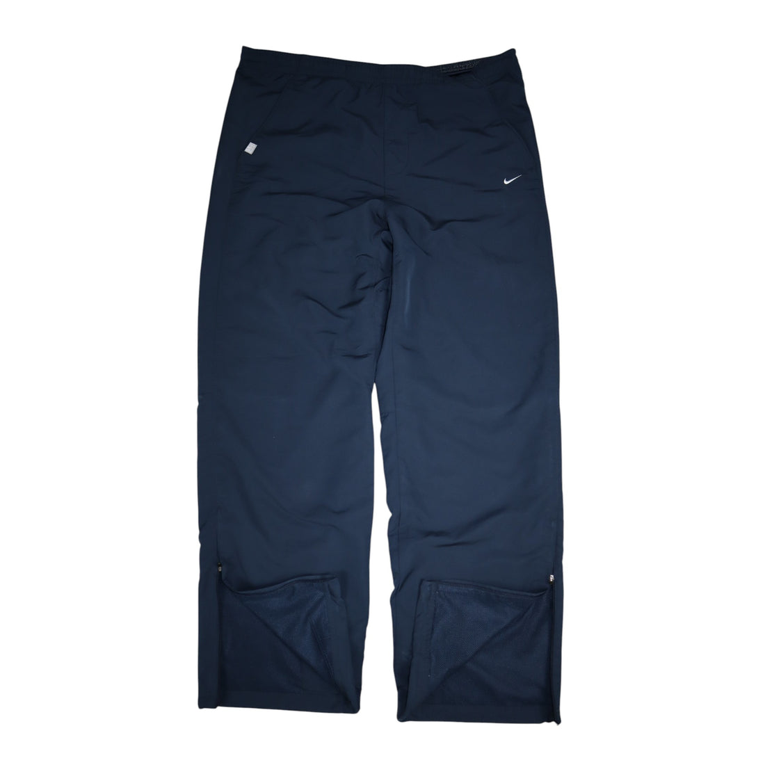 Late 2000s Nike Fit Dry trackpants in navy — flat lay