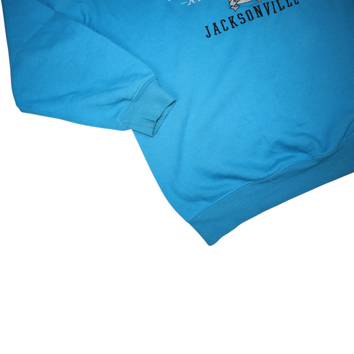 Gods Thrift Athens vintage teal Jacksonville Jaguars crewneck sweatshirt with ribbed cuffs and stitched logo detail.